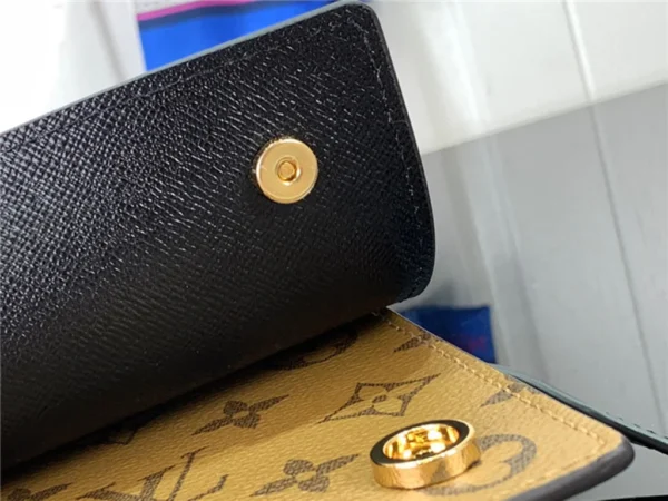 2023 Louis Vuitton Book Chain Wallet Bag M81830